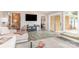 Open living room boasts a modern aesthetic, water views, and a serene ambiance at 5114 Leisure Ln, Sherrills Ford, NC 28673