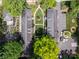 Aerial view of brick multi-Gathering building with parking at 524 Hawthorne Ln, Charlotte, NC 28204