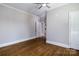 Room with beautiful hardwood floors and an open doorway leading to another room at 524 Hawthorne Ln, Charlotte, NC 28204