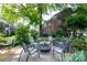 Outdoor patio with seating and fire pit at 524 Hawthorne Ln, Charlotte, NC 28204