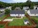 A fenced backyard features a small deck with outdoor seating, offering a private outdoor space at 532 Jedburgh Way, Rock Hill, SC 29730