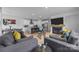 Open concept living area connecting kitchen, dining, and living spaces in a well-lit interior at 6032 Corbin Woods Ct, Charlotte, NC 28226