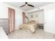 Comfortable bedroom with neutral tones, decorative gold accents and plush carpet at 628 Uwharrie River Rd, Charlotte, NC 28211