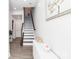 Inviting entryway with a staircase, cabinet, and stylish decor, creating a warm first impression at 628 Uwharrie River Rd, Charlotte, NC 28211