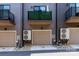 Townhome exterior featuring individual garages and private balconies at 628 Uwharrie River Rd, Charlotte, NC 28211