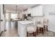 Bright kitchen showcases white countertops, a gray kitchen island, and modern pendant lighting at 628 Uwharrie River Rd, Charlotte, NC 28211