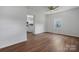 Bright living room with wood floors and neutral paint offers a ceiling fan and natural light at 639 S Eastway Dr, Troutman, NC 28166