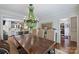 Charming dining room with views of a modern, updated kitchen at 6409 Ilex Ct, Charlotte, NC 28211