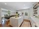Modern kitchen with a quartz island, stainless steel appliances, and open layout at 6409 Ilex Ct, Charlotte, NC 28211