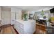 Spacious kitchen featuring a large center island and open layout to the dining area at 6409 Ilex Ct, Charlotte, NC 28211