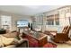 Well-lit living room with a cozy seating arrangement and neutral tones at 6409 Ilex Ct, Charlotte, NC 28211