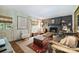 Cozy living room with a decorative fireplace and comfortable seating at 6409 Ilex Ct, Charlotte, NC 28211