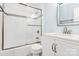 Modern bathroom with a glass-enclosed shower, white vanity, and stylish fixtures at 6908 Lancer Dr, Charlotte, NC 28226