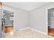 Spacious room with neutral walls and flooring, offering versatility and natural light at 6908 Lancer Dr, Charlotte, NC 28226