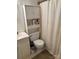 This bathroom features a toilet, sink, and cabinet for storage of personal items at 7316 Truelight Church Rd, Mint Hill, NC 28227