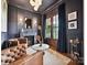 Cozy living room featuring a marble fireplace, ample seating, and stylish decor at 735 Davidson Run Ln, Davidson, NC 28036