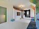 Bright playroom featuring custom playhouses, climbing walls, and a designated reading area at 735 Davidson Run Ln, Davidson, NC 28036