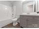 Bathroom featuring vanity with grey cabinets and shower-tub combo at 737 Lynville Ln, Rock Hill, SC 29730