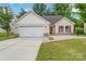 Charming one-story home featuring a one car garage and stone accents at 737 Lynville Ln, Rock Hill, SC 29730