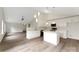 Bright kitchen featuring white cabinetry, an island, and stainless steel appliances at 737 Lynville Ln, Rock Hill, SC 29730