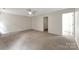 Spacious main bedroom featuring neutral carpeting and a ceiling fan at 737 Lynville Ln, Rock Hill, SC 29730