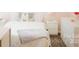 Bright bedroom with bed, side tables, and ample storage at 7708 Harrington Woods Rd, Charlotte, NC 28269