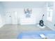 Spacious bedroom features white walls, stylish flooring and modern decor at 7708 Harrington Woods Rd, Charlotte, NC 28269