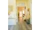 Welcoming foyer with hardwood floors, neutral walls, and stylish decor at 7708 Harrington Woods Rd, Charlotte, NC 28269