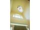 Bright foyer featuring a modern chandelier and arched window at 7708 Harrington Woods Rd, Charlotte, NC 28269