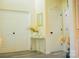 Hallway featuring a decorative console table and doors at 7708 Harrington Woods Rd, Charlotte, NC 28269