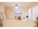 Comfortable living room featuring a brick fireplace and ample seating at 7708 Harrington Woods Rd, Charlotte, NC 28269