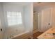 Bathroom featuring a garden tub and stand up shower at 7830 Shiny Meadow Ln, Charlotte, NC 28215