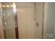 Bathroom featuring a stand up shower with glass door at 7830 Shiny Meadow Ln, Charlotte, NC 28215