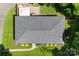 An aerial image features a roof, manicured lawn, sidewalk, and garden plants around the foundation at 7921 Willhill Rd, Mint Hill, NC 28227