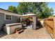 Cozy backyard featuring a hot tub, brick pavers and an outdoor gazebo seating area at 7921 Willhill Rd, Mint Hill, NC 28227