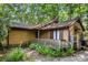 Rustic exterior of a cozy home with wooden siding and a quaint front porch at 8007 Red Lantern Rd, Indian Trail, NC 28079