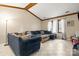 Spacious living room featuring tile floors, large windows, and vaulted ceilings at 8007 Red Lantern Rd, Indian Trail, NC 28079