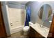 Cozy bathroom with tub and shower combo with newer vanity at 8742 Rittenhouse Cir, Charlotte, NC 28270