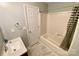 Clean bathroom featuring shower-tub combo and nice sized vanity and sink at 8742 Rittenhouse Cir, Charlotte, NC 28270