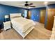 The main bedroom features hardwood floors, a ceiling fan, and two closets at 8742 Rittenhouse Cir, Charlotte, NC 28270