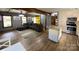 Open floorplan connecting the kitchen, living room, and foyer, enhancing the sense of space and flow at 8742 Rittenhouse Cir, Charlotte, NC 28270