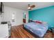 Comfortable bedroom with hardwood floors and ensuite bathroom at 9623 Duxford Ln, Charlotte, NC 28269