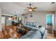 Inviting living room flows to dining area, featuring hardwood floors and a neutral color palette at 9623 Duxford Ln, Charlotte, NC 28269