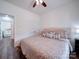Comfortable bedroom with a patterned bedspread, neutral tones, and closet at 0000 Trull Hinson Rd # 2, Wingate, NC 28174