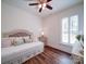 Bedroom with a daybed, a window with shutters, and natural lighting at 0000 Trull Hinson Rd # 2, Wingate, NC 28174