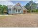 This home features well manicured landscaping and an attached garage at 0000 Trull Hinson Rd # 2, Wingate, NC 28174