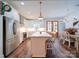 Bright kitchen with a large island, stainless appliances, and modern lighting at 0000 Trull Hinson Rd # 2, Wingate, NC 28174