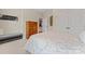 Bedroom features a dresser, closet doors, with plush carpet, and natural lighting at 10620 Euclid Nw Ave, Concord, NC 28027
