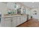 Open kitchen area with stainless steel appliances, granite countertops, and an open view of the living room at 10620 Euclid Nw Ave, Concord, NC 28027