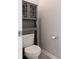 Cozy half-bathroom with elegant fixtures and neutral color palette at 11109 Pond Valley Ct, Charlotte, NC 28269
